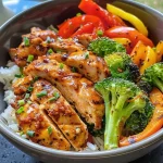 Close-up of a Chicken and Veggie Power Bowl with colorful ingredients.