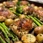 Deliciously plated garlic butter chicken with vibrant mixed vegetables.