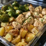 ['Close-up of a colorful Ranch Chicken Meal Prep with chicken, broccoli, and potatoes.', 'Juicy Ranch Chicken surrounded by seasoned potatoes and broccoli in meal prep containers.', 'Side view of a delicious meal prep featuring Ranch Chicken and fresh vegetables on a table.', 'Tasty Ranch Chicken Meal Prep with vibrant broccoli and golden-brown potatoes displayed.']