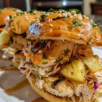 ['Juicy Teriyaki Chicken Sliders with pineapple rings on a wooden board.', 'Close-up side view of Teriyaki Chicken Sliders with provolone cheese and coleslaw.', 'Teriyaki Chicken Sliders stacked with vibrant coleslaw and a drizzle of sauce.', 'Delicious Teriyaki Chicken Sliders garnished with fresh ingredients.']
